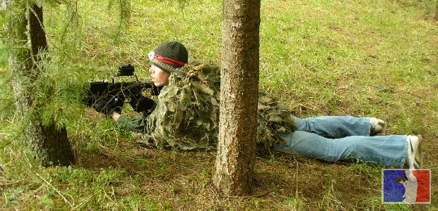 Elements of stealth shown here are lack of movement, color coordination with the surroundings, and disruption of the silhouette